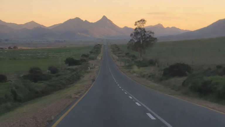 A quiet road at dusk, symbolising a personal threshold and the moment of choosing oneself.