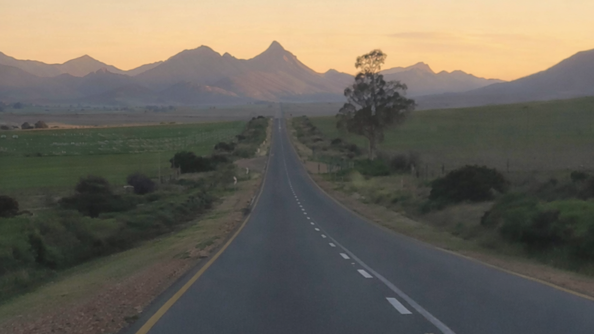 A quiet road at dusk, symbolising a personal threshold and the moment of choosing oneself.