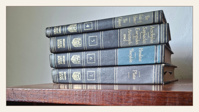 Stack of Great Books reflecting on power, emotional response, and judgement in The Iliad