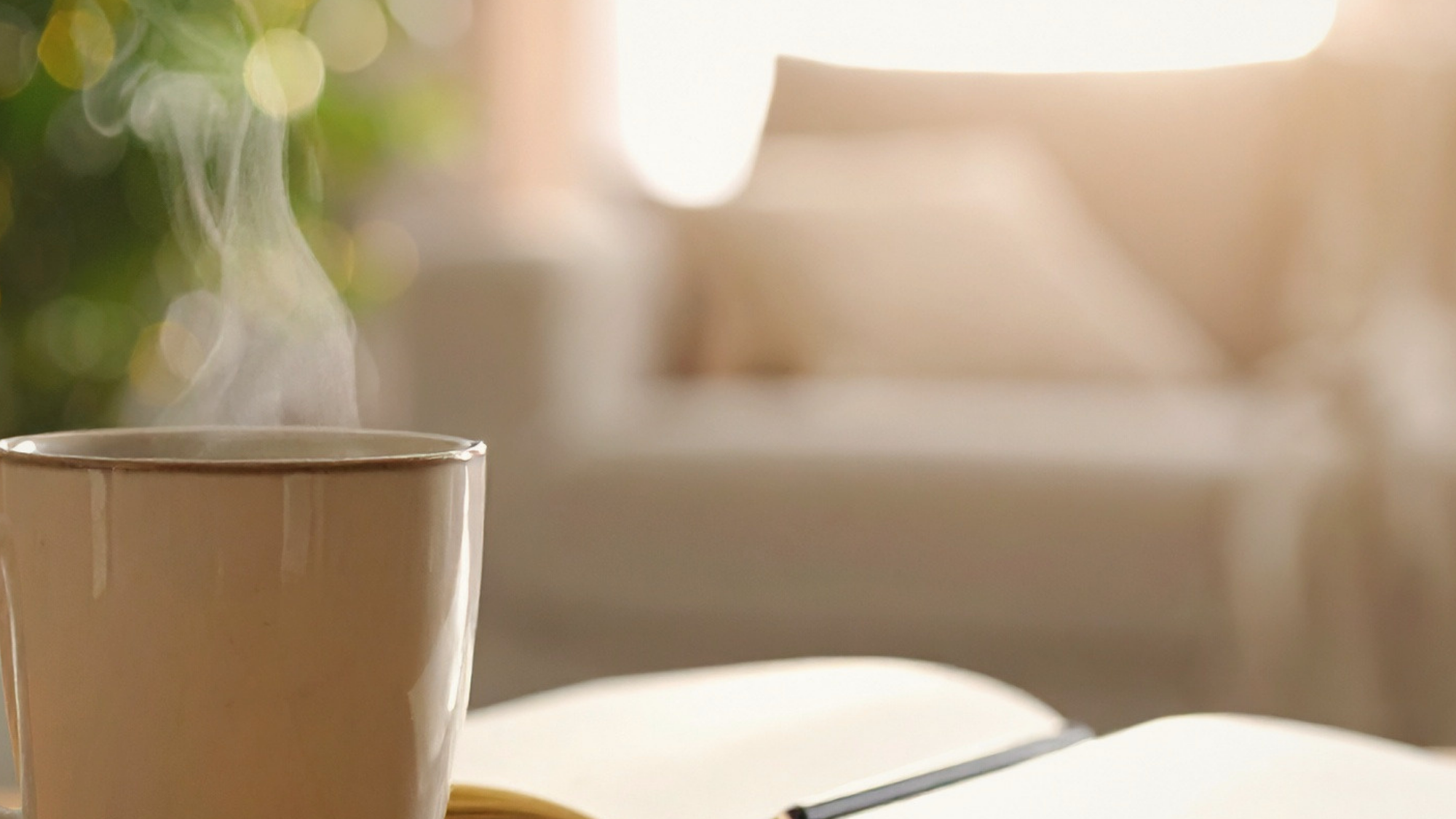 Soft morning light with coffee and an open book in a quiet reflective setting